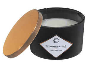 Bougie parfumée dans un pot noir à 3 mèches - 14 oz